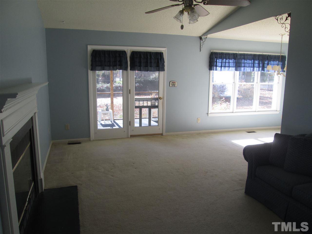2600 Denbigh Court Raleigh, NC 27604 - Photo 5 of 13 a view of livingroom with furniture window and a ceiling fan