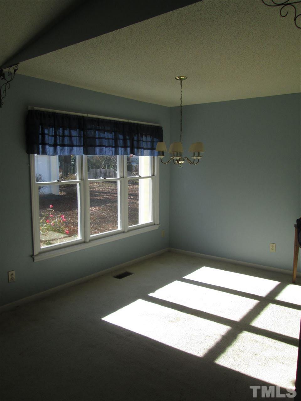 2600 Denbigh Court Raleigh, NC 27604 - Photo 6 of 13 view of an empty room with a window