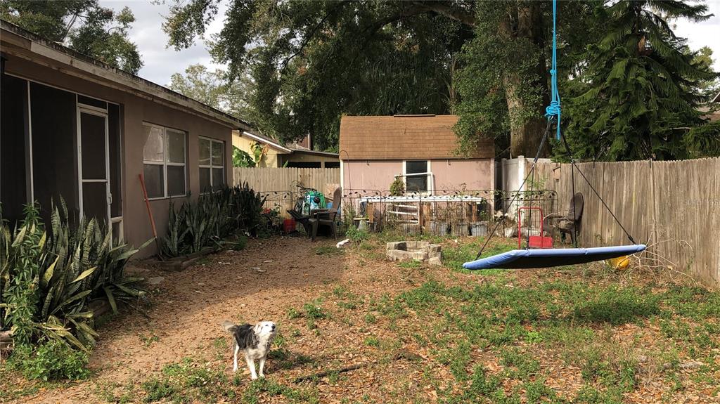 1727 Tallowtree Circle Valrico, FL 33594 - Photo 5 of 5 a view of a house with backyard and sitting area