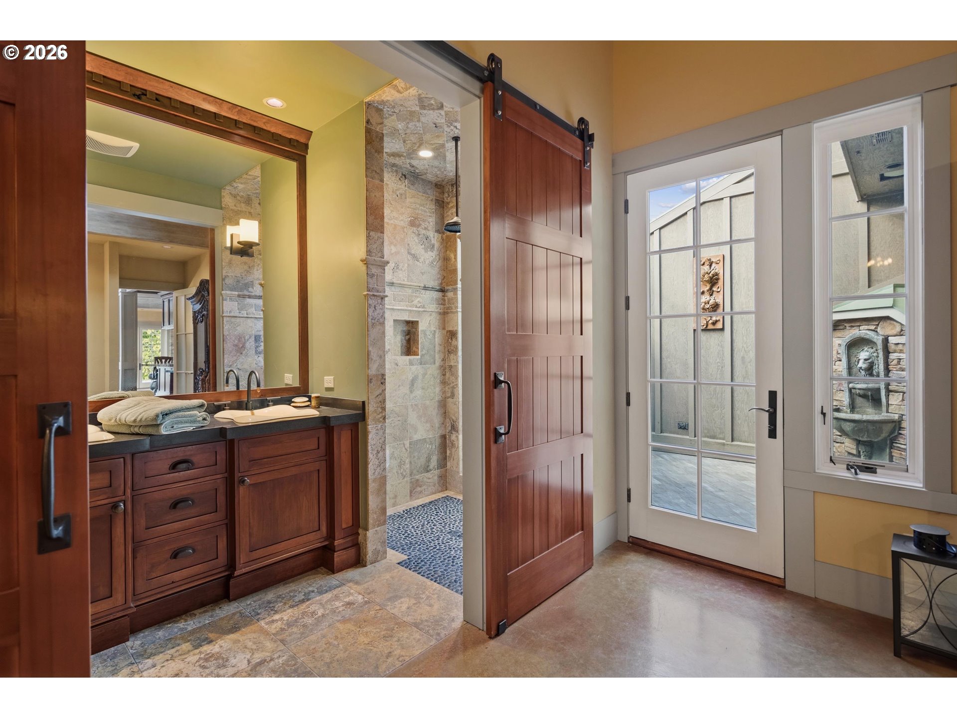 545 McAdams Road East Longview, WA 98632 - Photo 23 of 46 a bathroom with a glass door shower a sink and a mirror