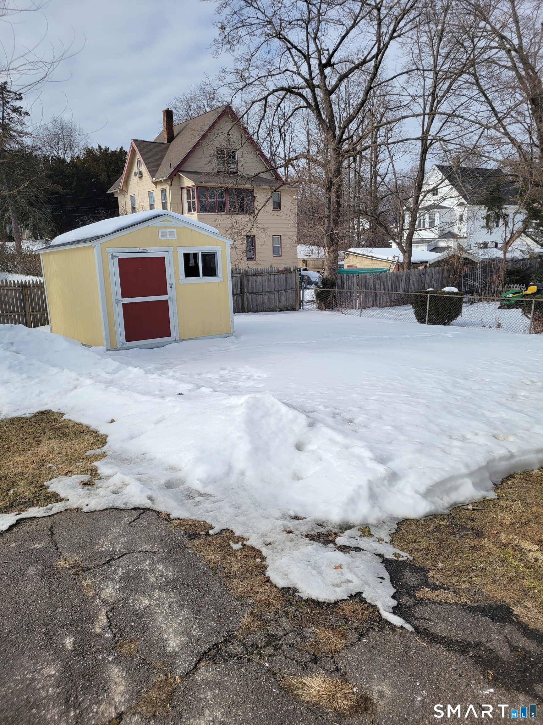 32 Stanley Street Naugatuck, CT 06770 - Photo 24 of 25 a view of a house with snow on the road