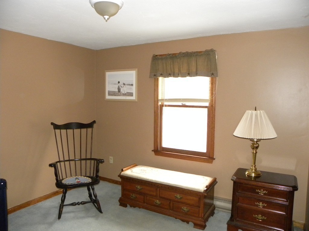 129 Old Worcester Road Charlton, MA 01507 - Photo 16 of 30 a room with a bed and a window