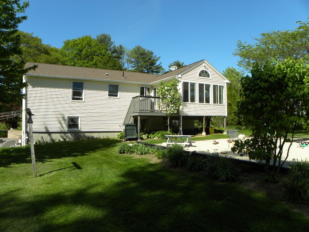129 Old Worcester Road Charlton, MA 01507 - Photo 28 of 30 a front view of a house with a garden