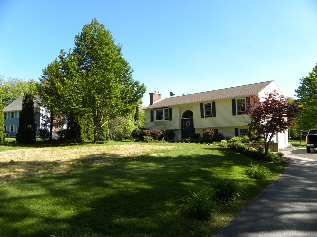 129 Old Worcester Road Charlton, MA 01507 - Photo 30 of 30 a front view of house with yard and green space