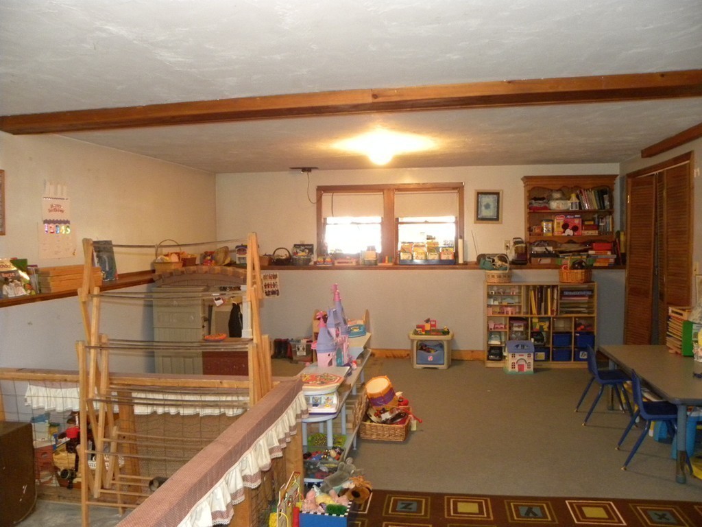 129 Old Worcester Road Charlton, MA 01507 - Photo 10 of 30 a view of a living room and a garage