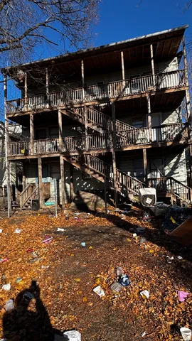 a view of a building with retail shops