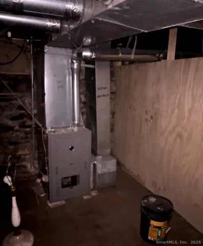 a bathroom with a shower and a toilet