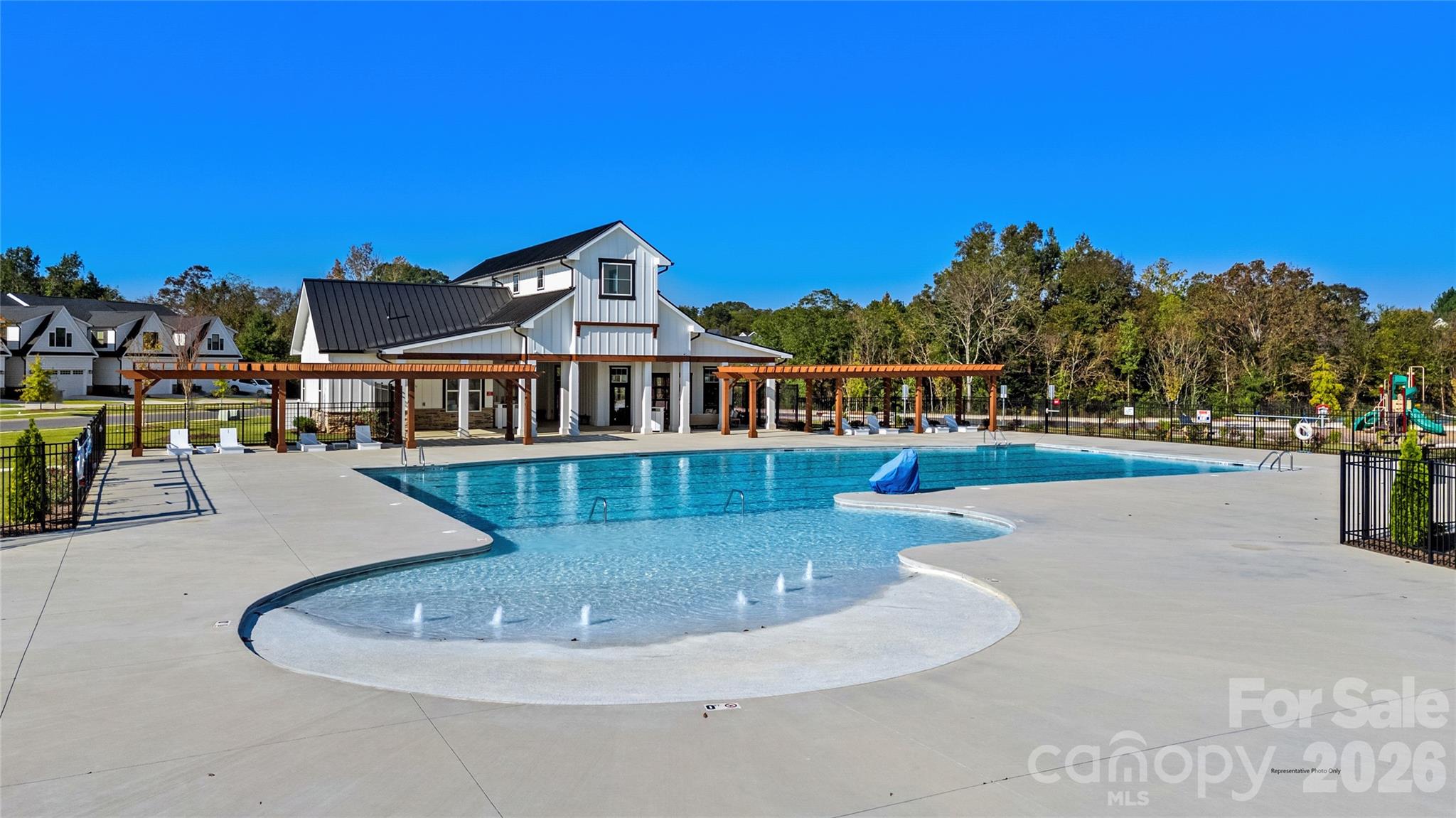 1029 Bracken Hill Road Indian Trail, NC 28079 - Photo 18 of 28 a view of a house with a swimming pool