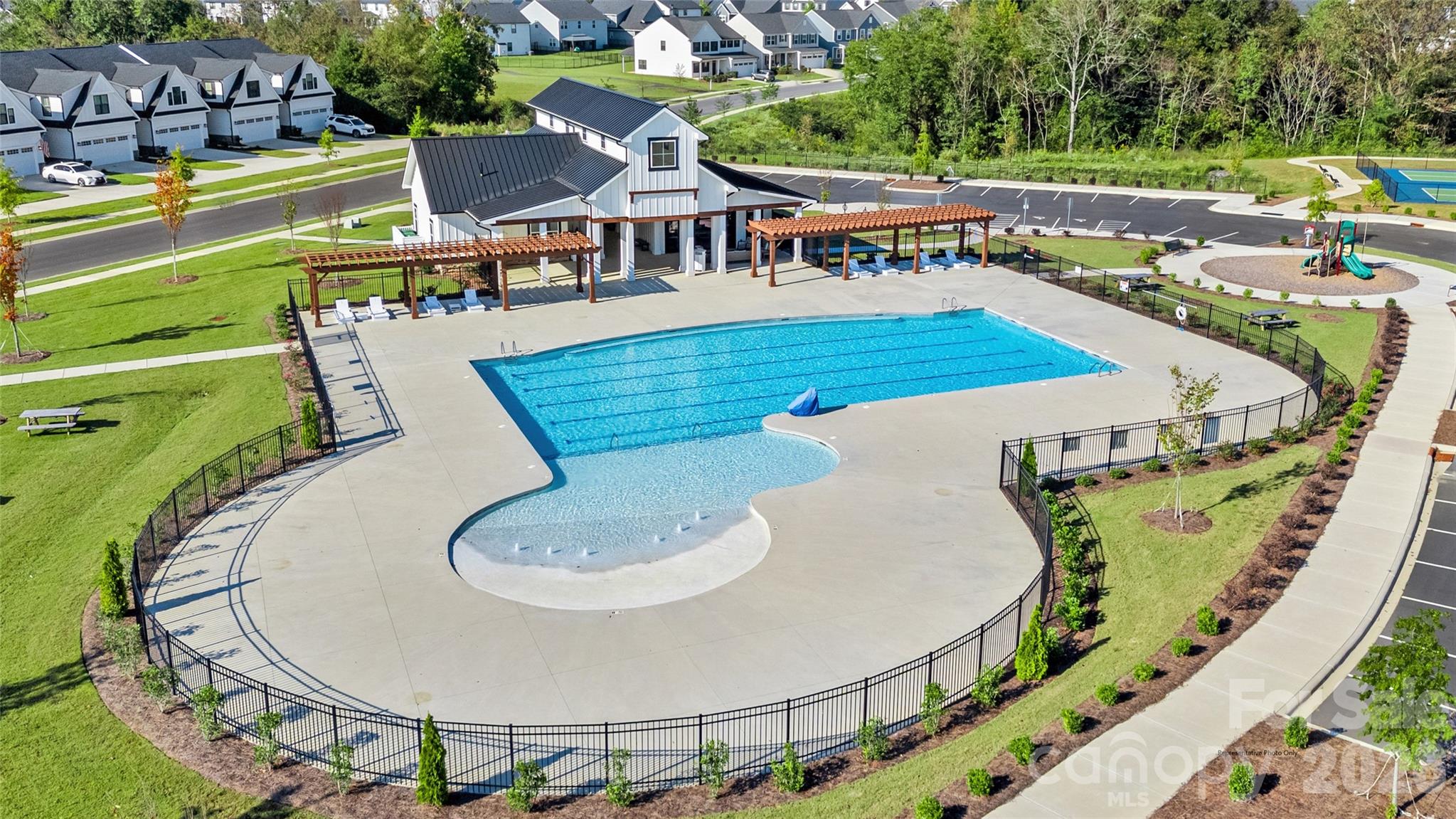 1029 Bracken Hill Road Indian Trail, NC 28079 - Photo 19 of 28 an aerial view of a house with swimming pool garden and patio