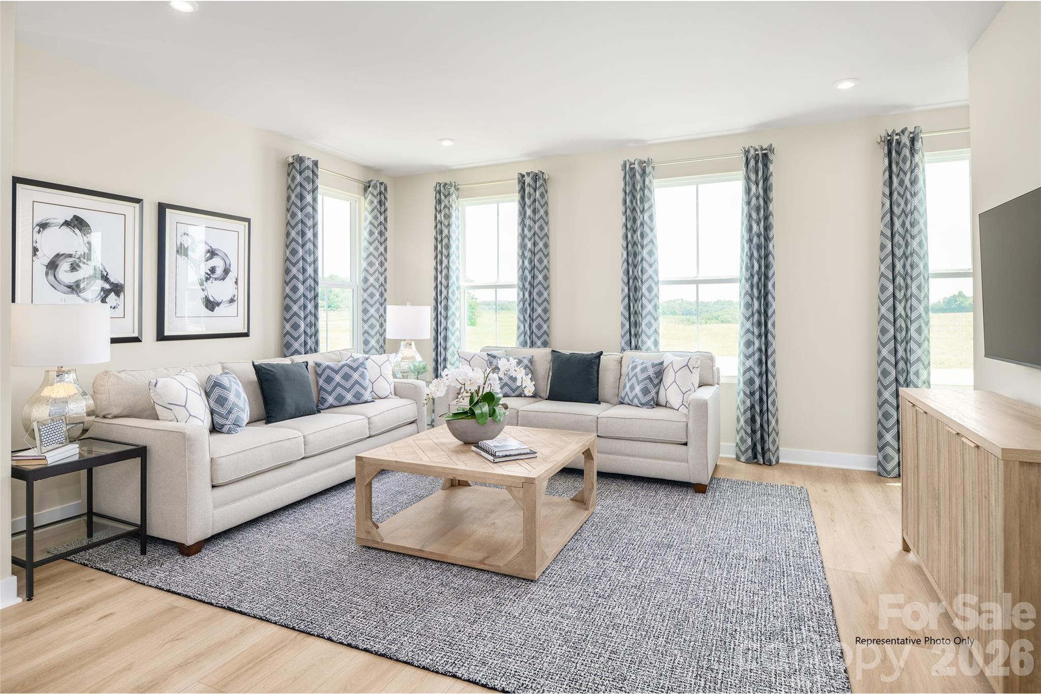 1029 Bracken Hill Road Indian Trail, NC 28079 - Photo 7 of 28 a living room with furniture and a large window