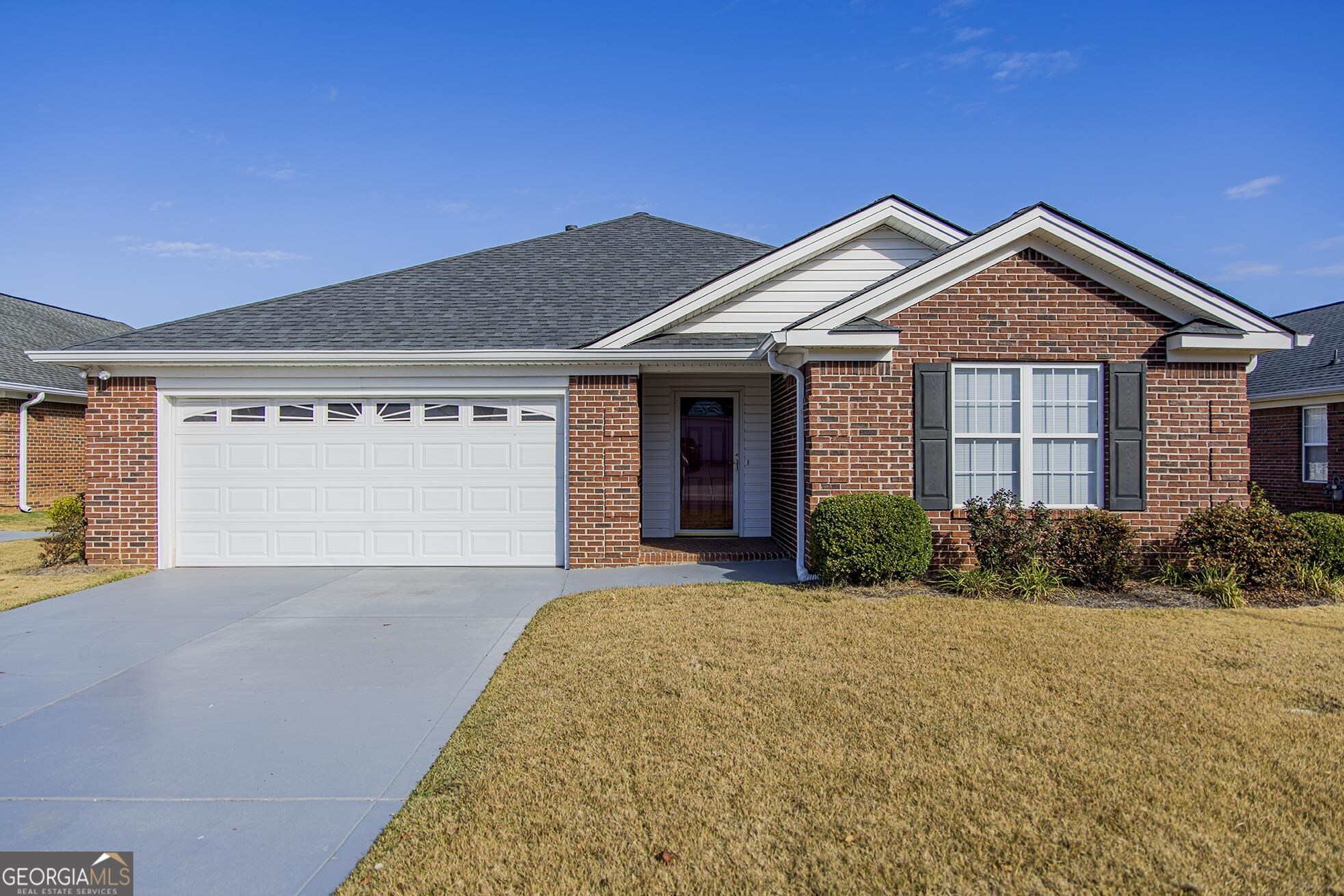 2675 North Broad Street Rome, GA 30161 - Photo 1 of 1 a front view of a house with a yard and garage