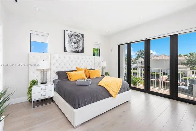 a living room with a potted plant