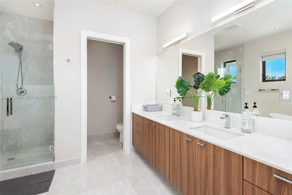 a white bath tub sitting in a bathroom