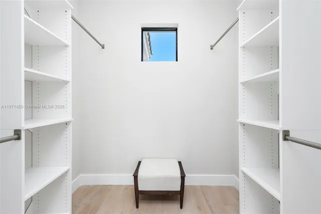 a view of balcony with wooden floor