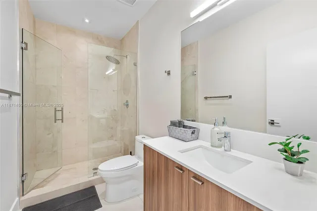 a view of a house with pool and sitting area