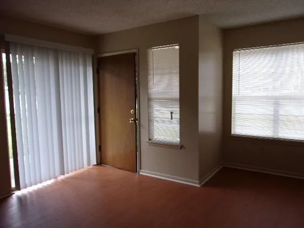 a view of an empty room and window