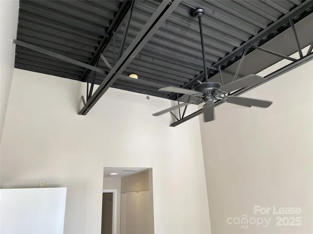 a view of a room with racks on the wall