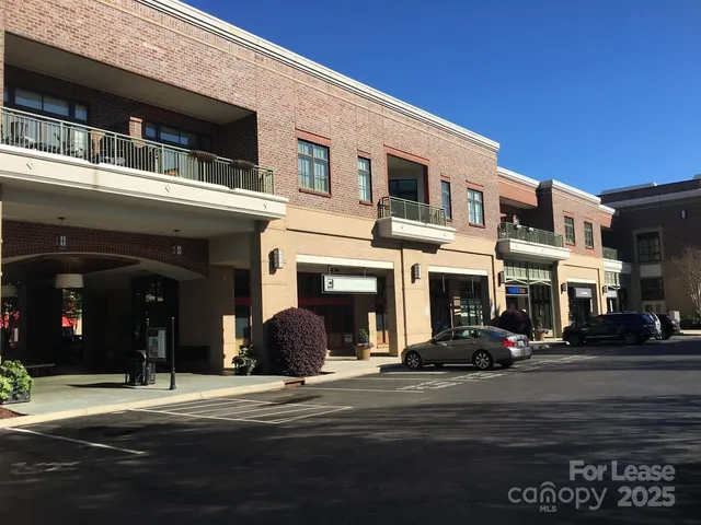 a view of a building with a street