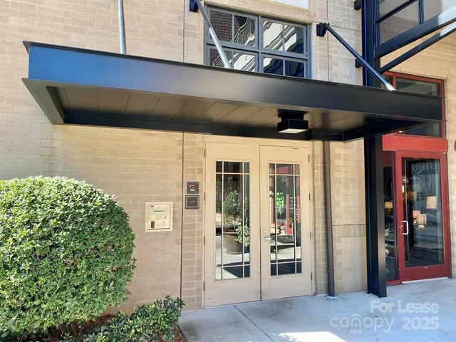 a front view of a building with a shower