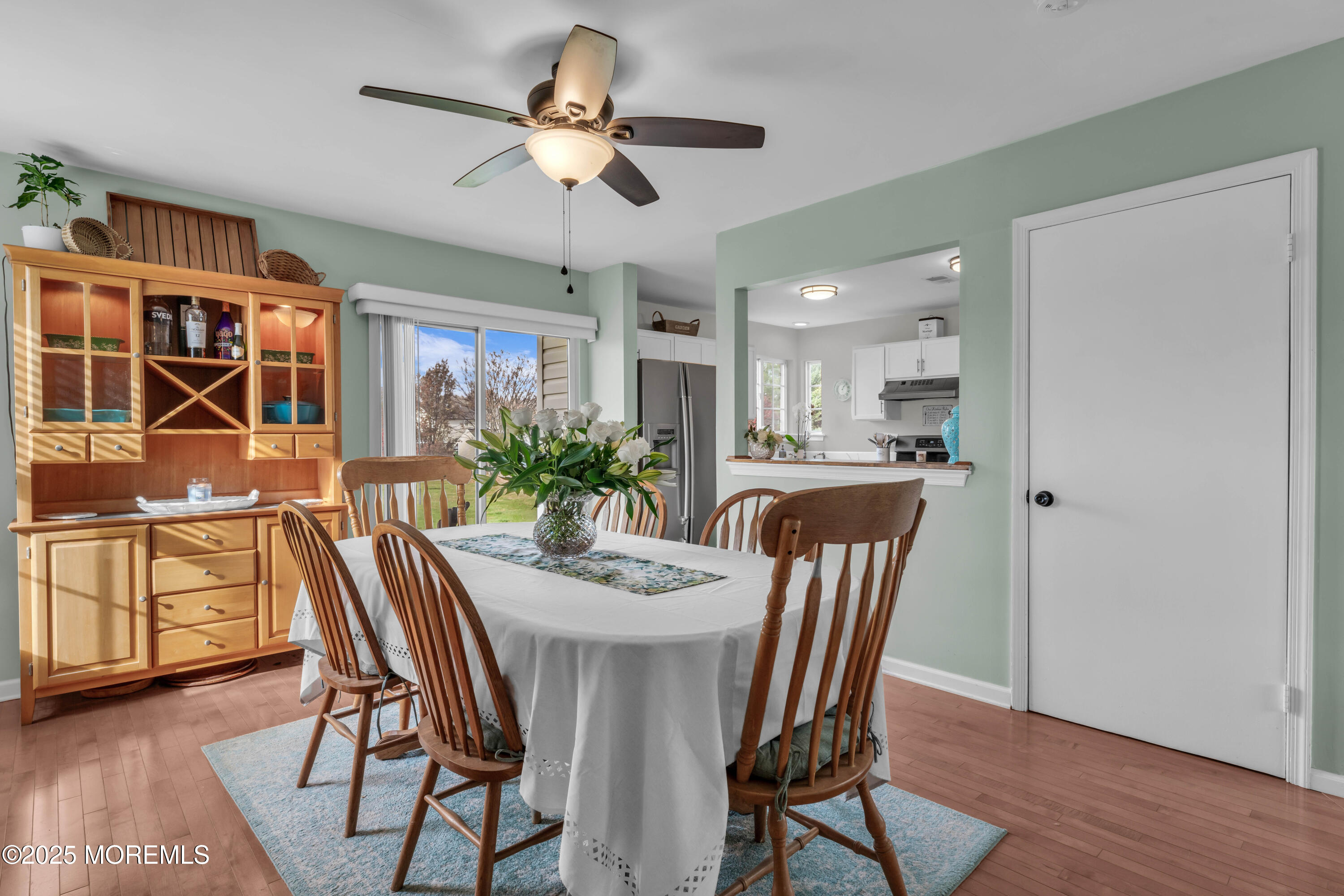 6 Hummingbird Way Jackson, NJ 08527 - Photo 13 of 39 a view of a dining room with furniture and wooden floor
