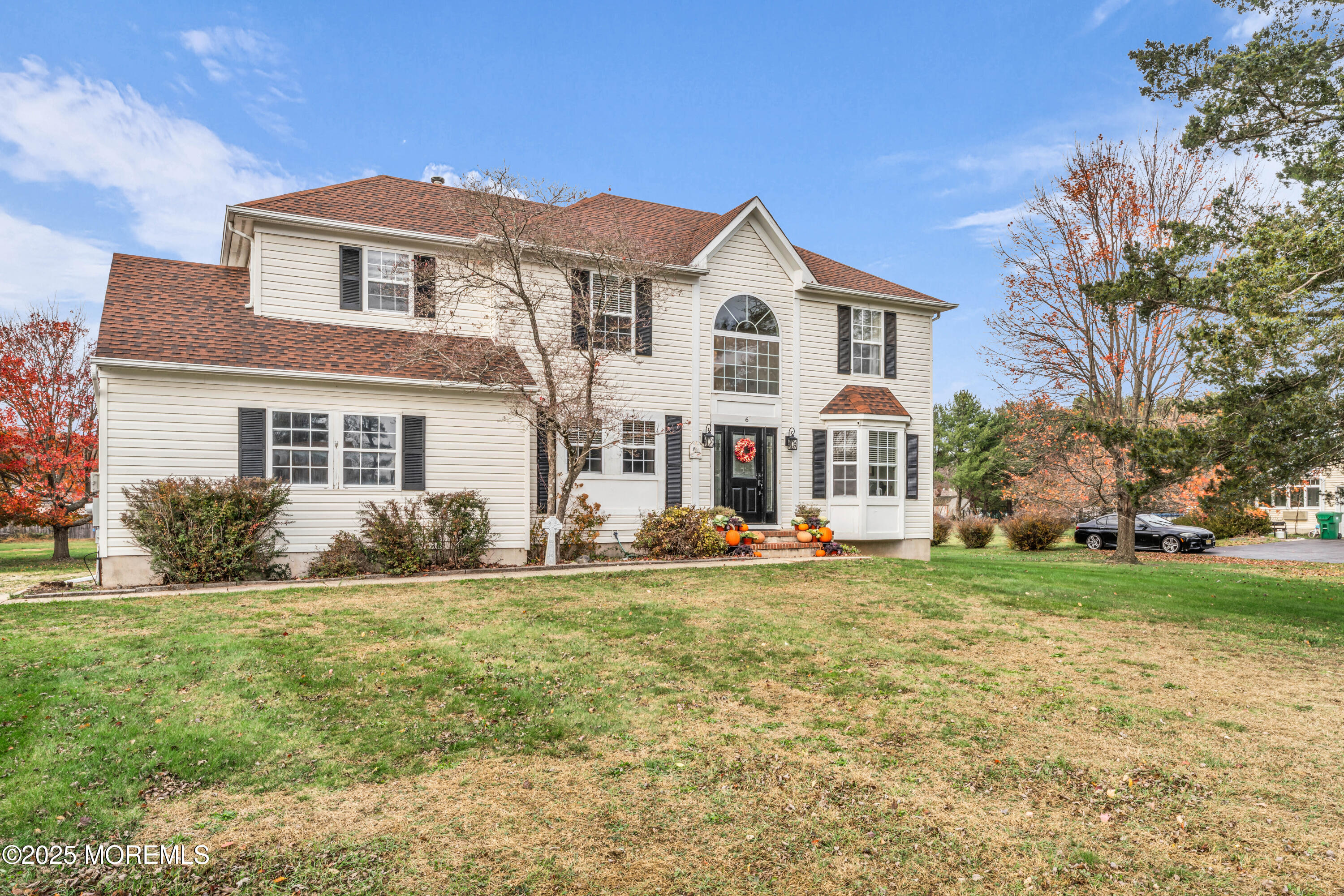 6 Hummingbird Way Jackson, NJ 08527 - Photo 2 of 39 a view of a house with a yard and large trees