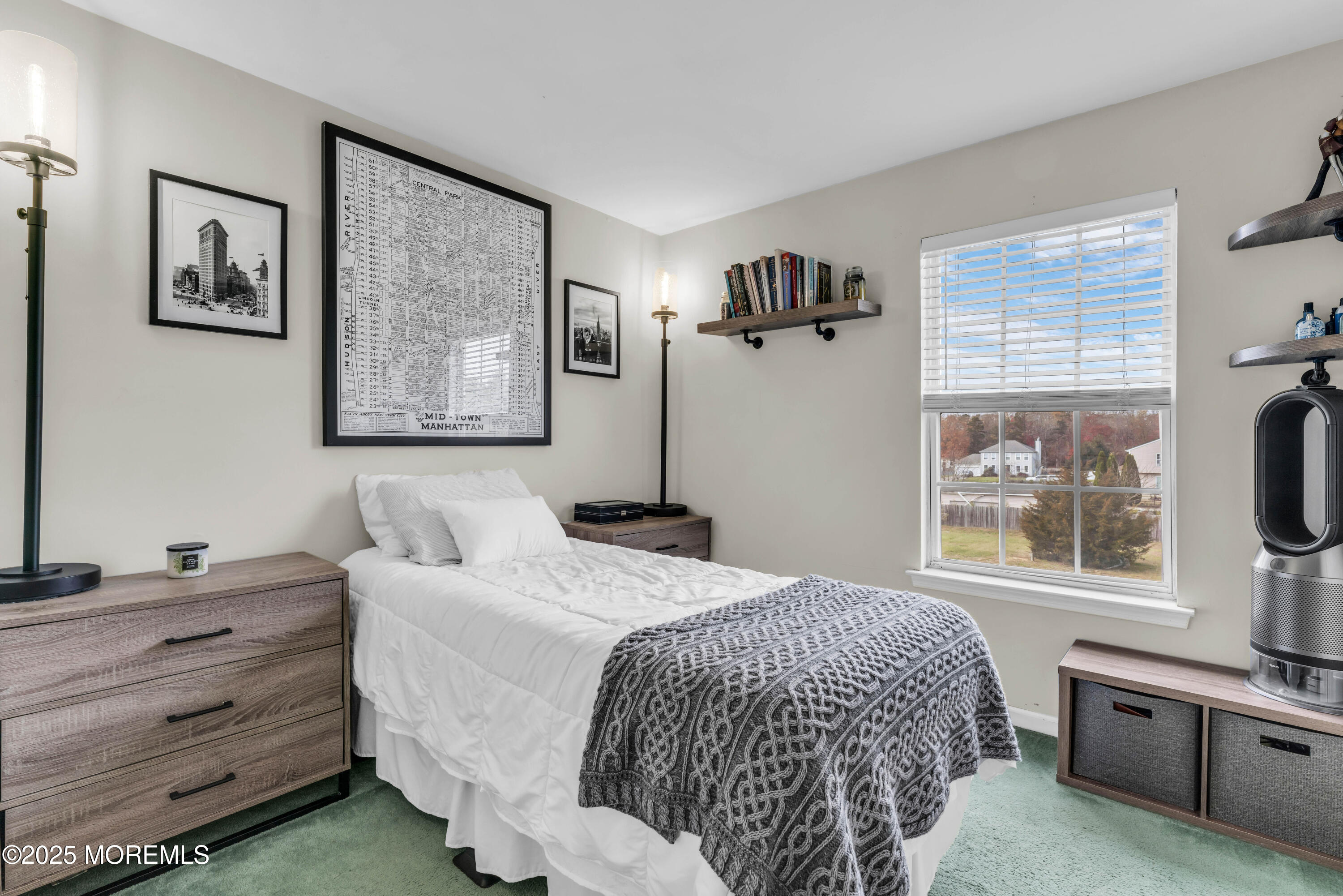 6 Hummingbird Way Jackson, NJ 08527 - Photo 21 of 39 a bedroom with a bed and a flat screen tv