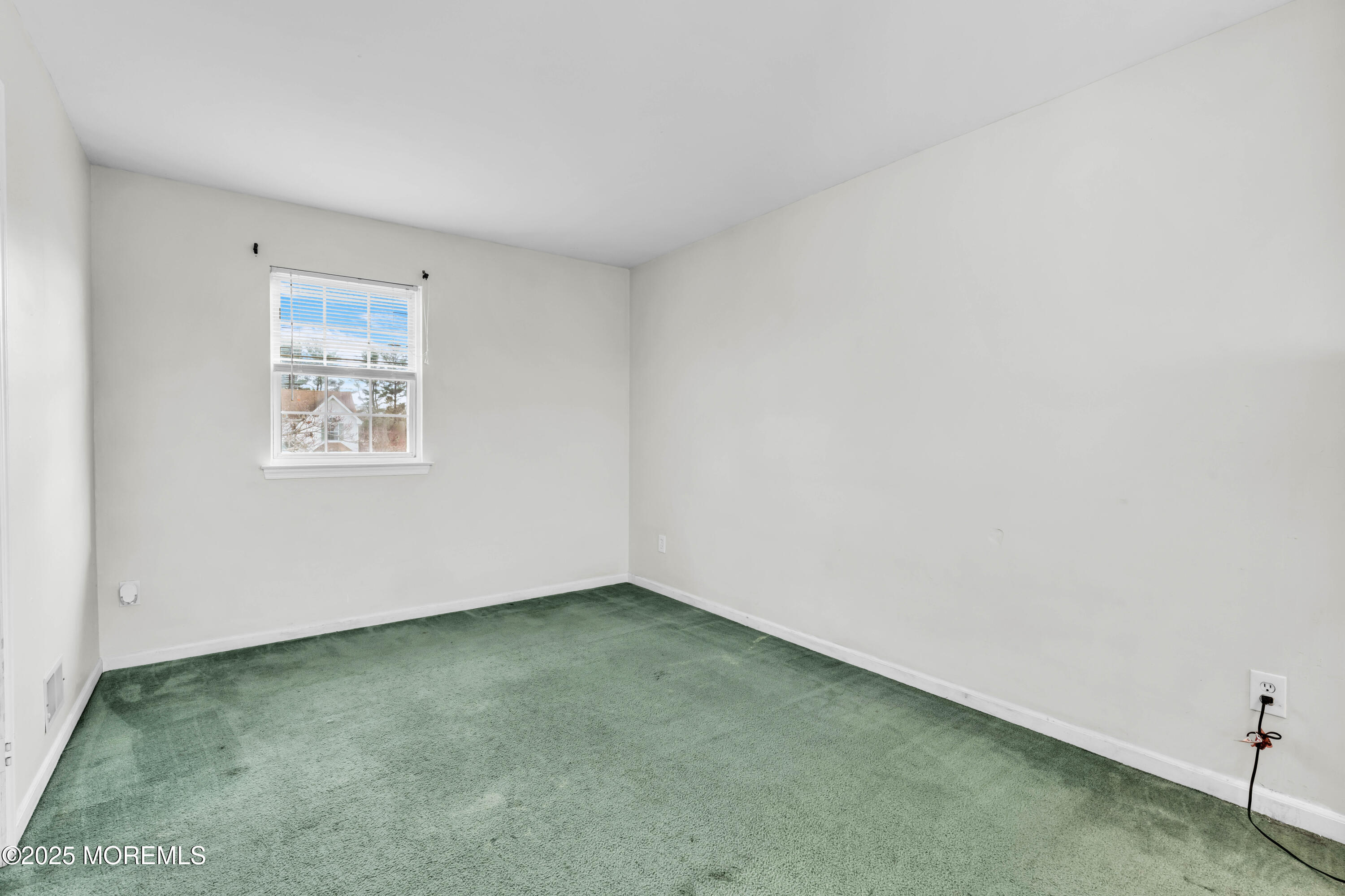 6 Hummingbird Way Jackson, NJ 08527 - Photo 23 of 39 an empty room with a window