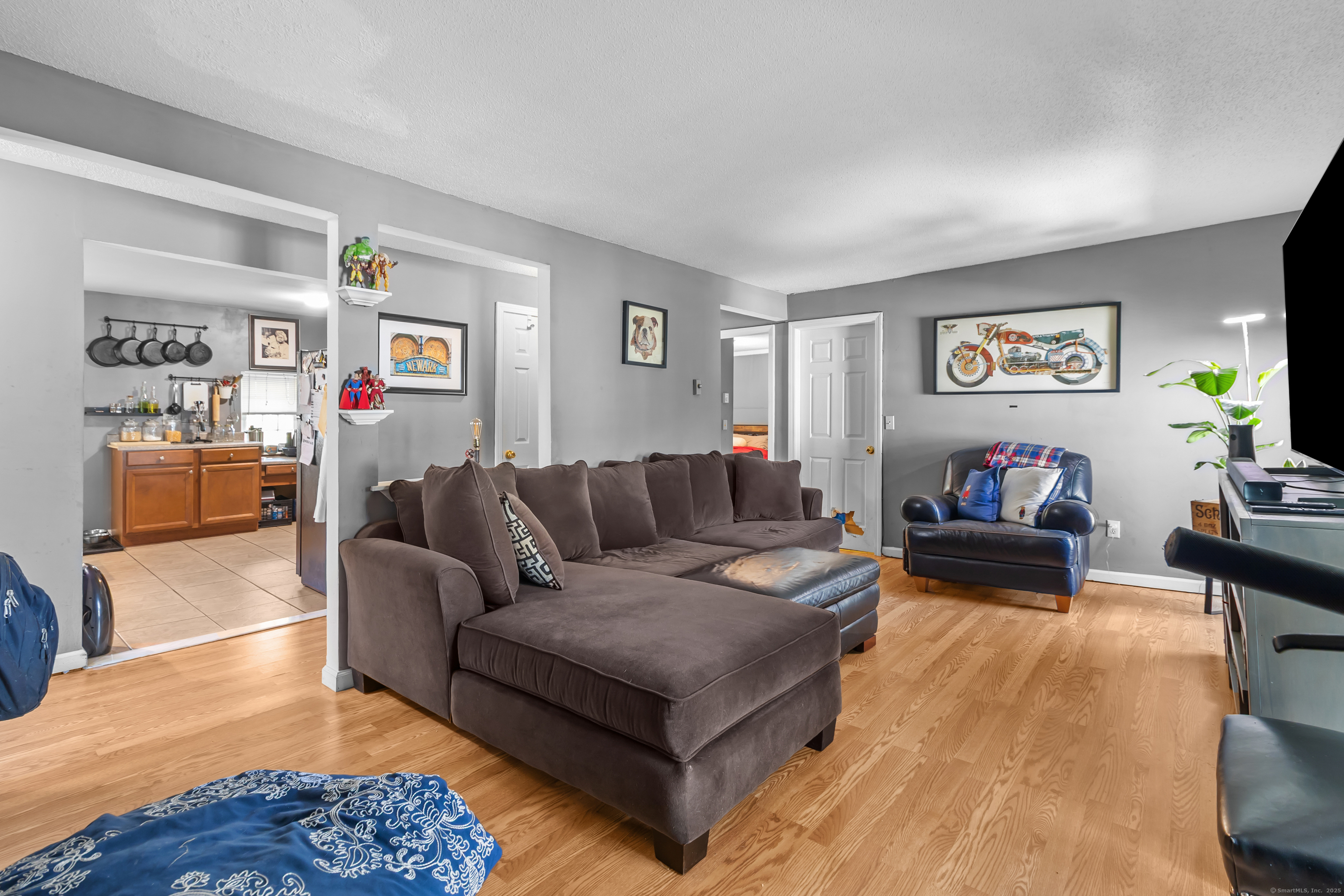 136 Washington Street Norwich, CT 06360 - Photo 16 of 40 a living room with furniture and a couch