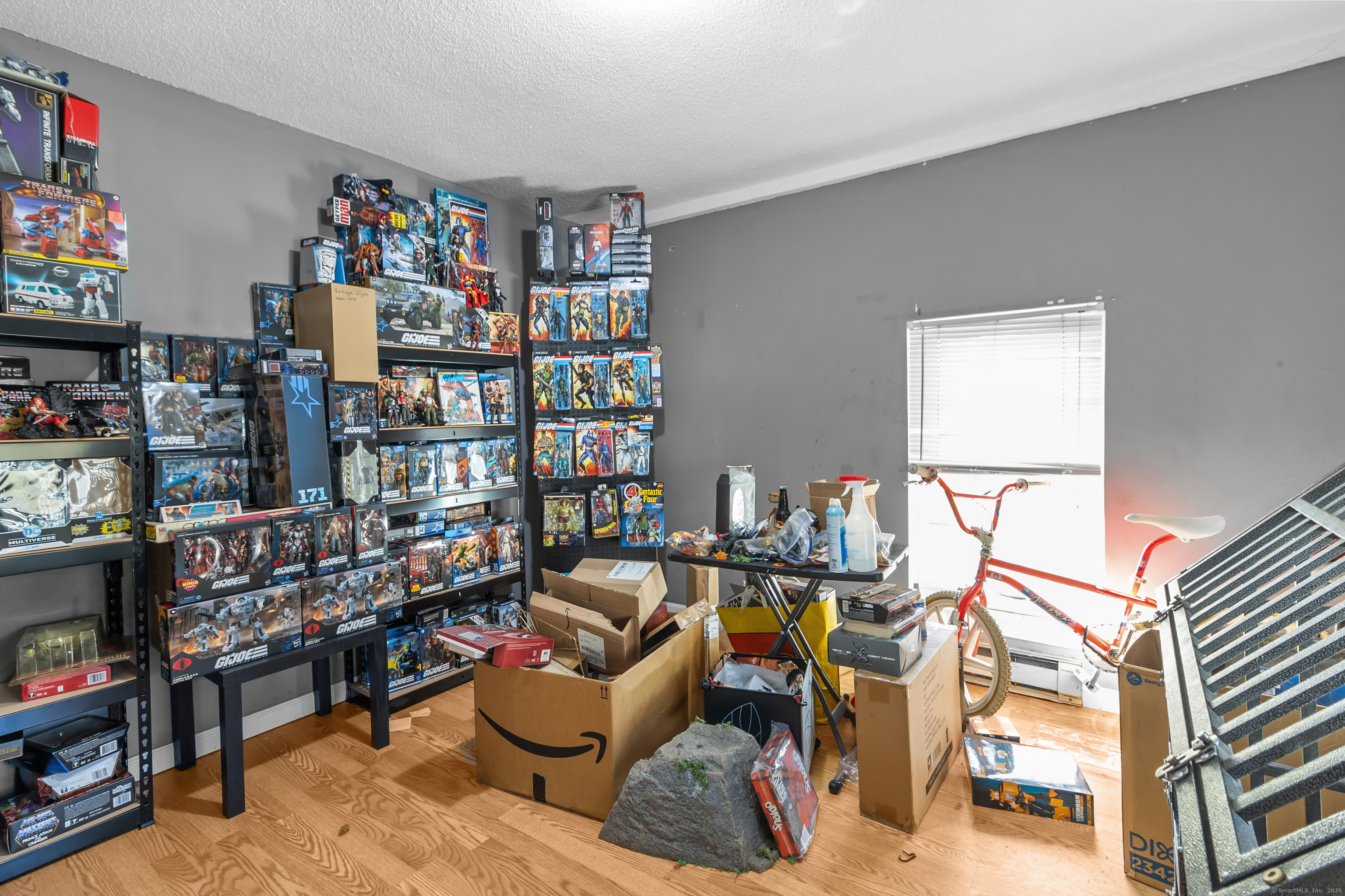 136 Washington Street Norwich, CT 06360 - Photo 25 of 40 a reading room with furniture and a book shelf