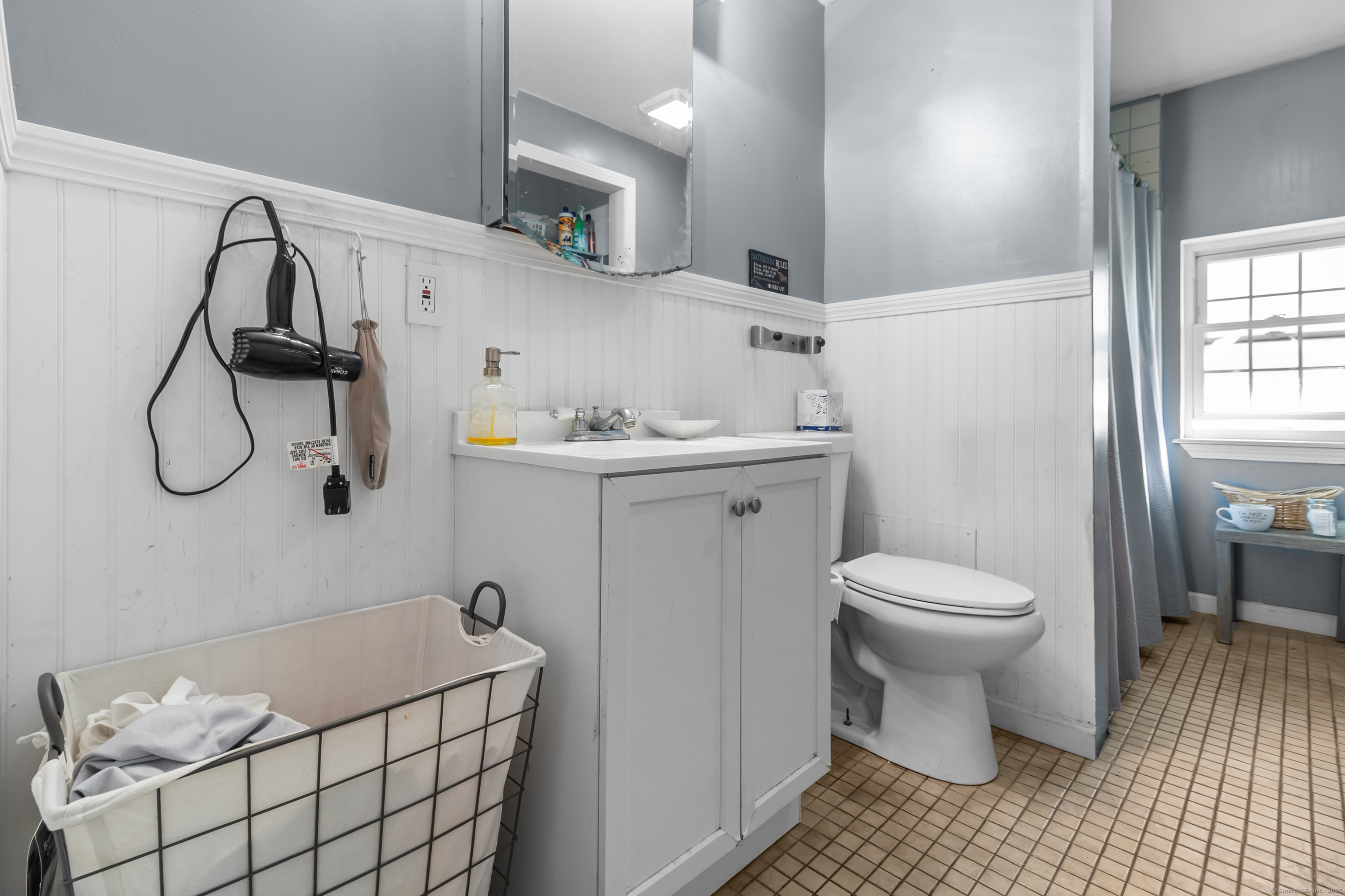 136 Washington Street Norwich, CT 06360 - Photo 26 of 40 a bathroom with a sink toilet and shower