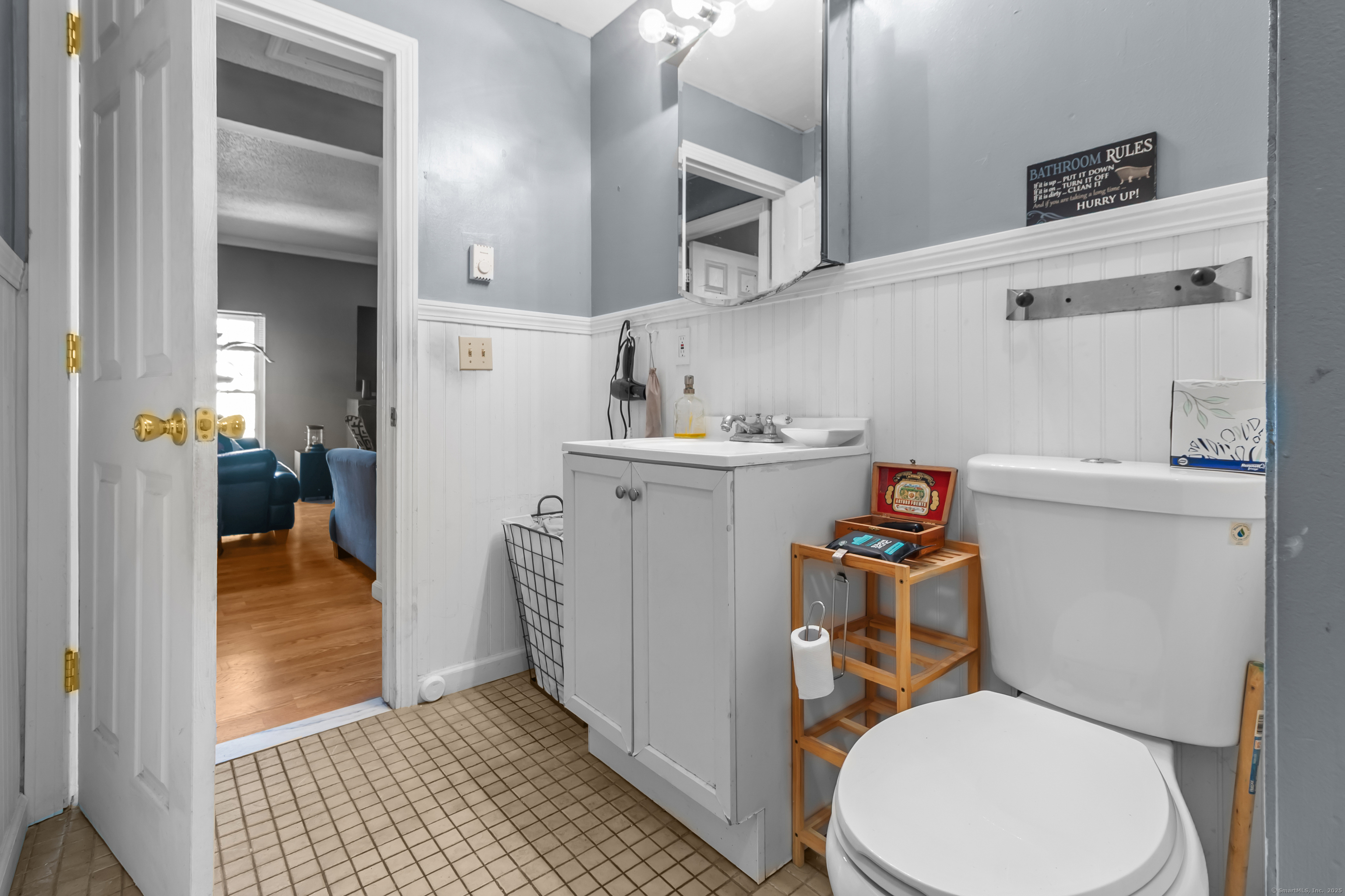 136 Washington Street Norwich, CT 06360 - Photo 27 of 40 a bathroom with a sink toilet and shower