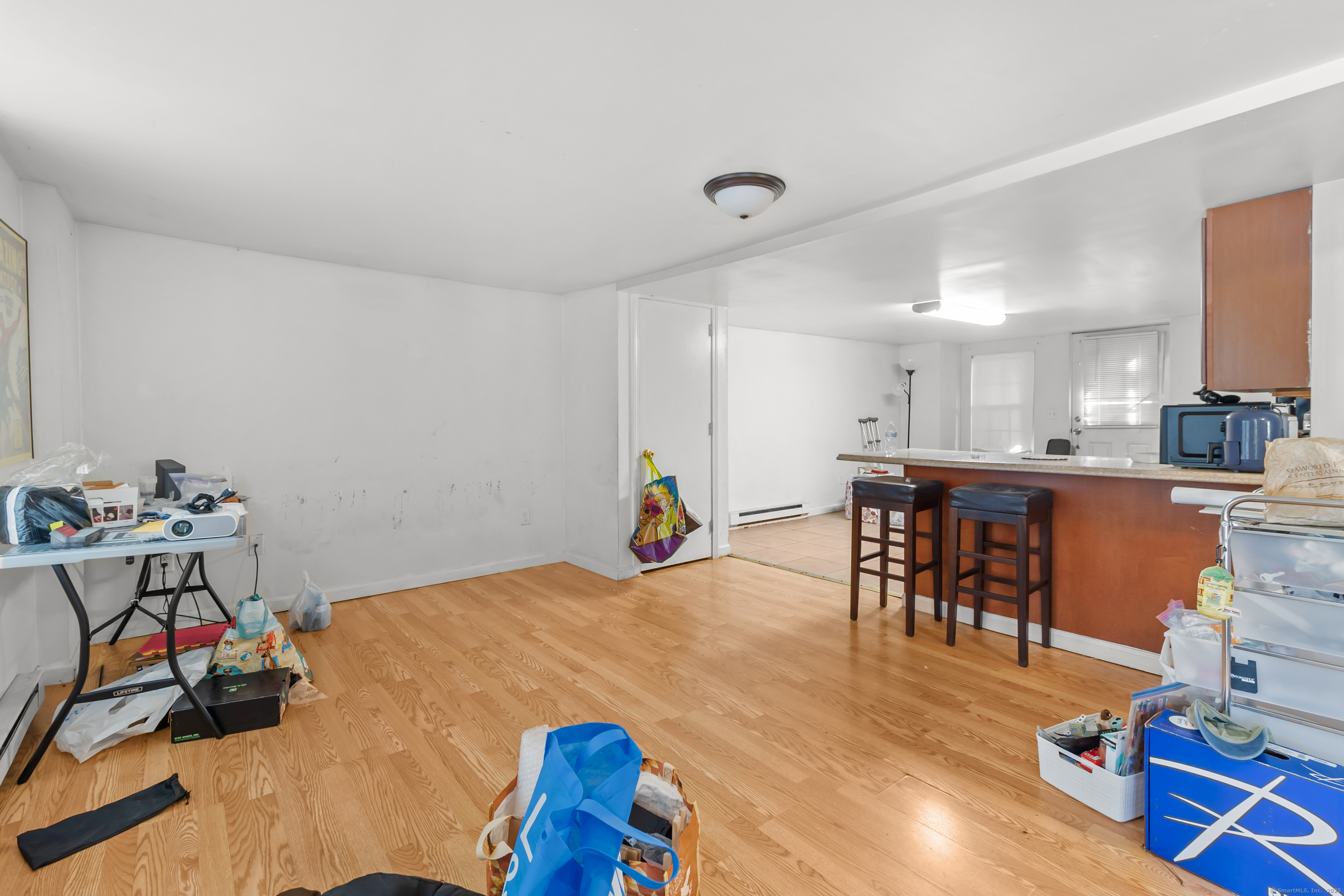 136 Washington Street Norwich, CT 06360 - Photo 29 of 40 a view of a room with furniture and toys