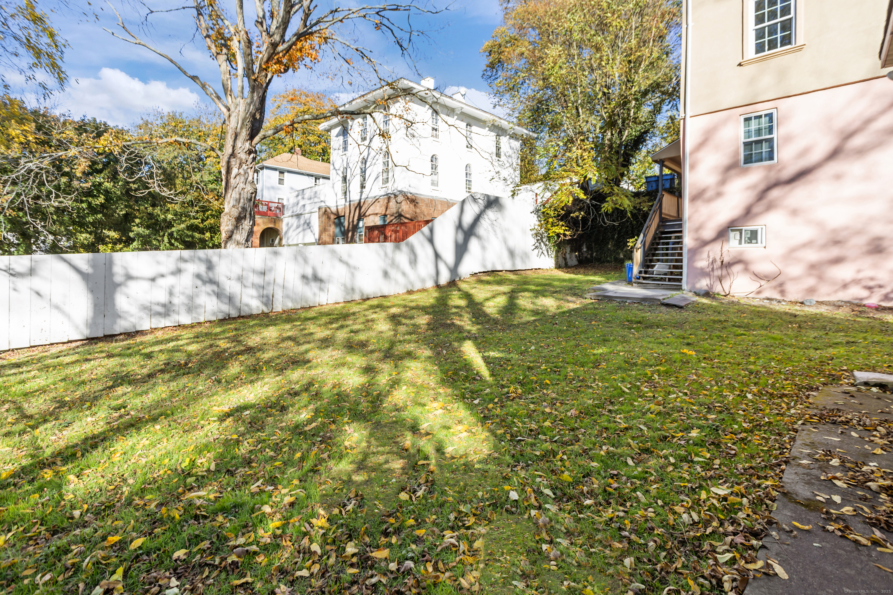 136 Washington Street Norwich, CT 06360 - Photo 40 of 40 a view of swimming pool with an outdoor space