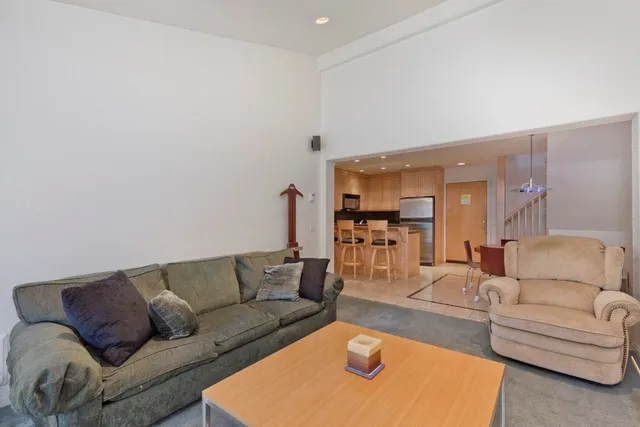 a living room with furniture and a couch