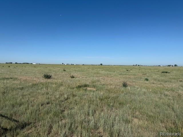 4 Parcel 2 Wiggins, CO 80654 - Photo 3 of 3 a view of a field with an ocean