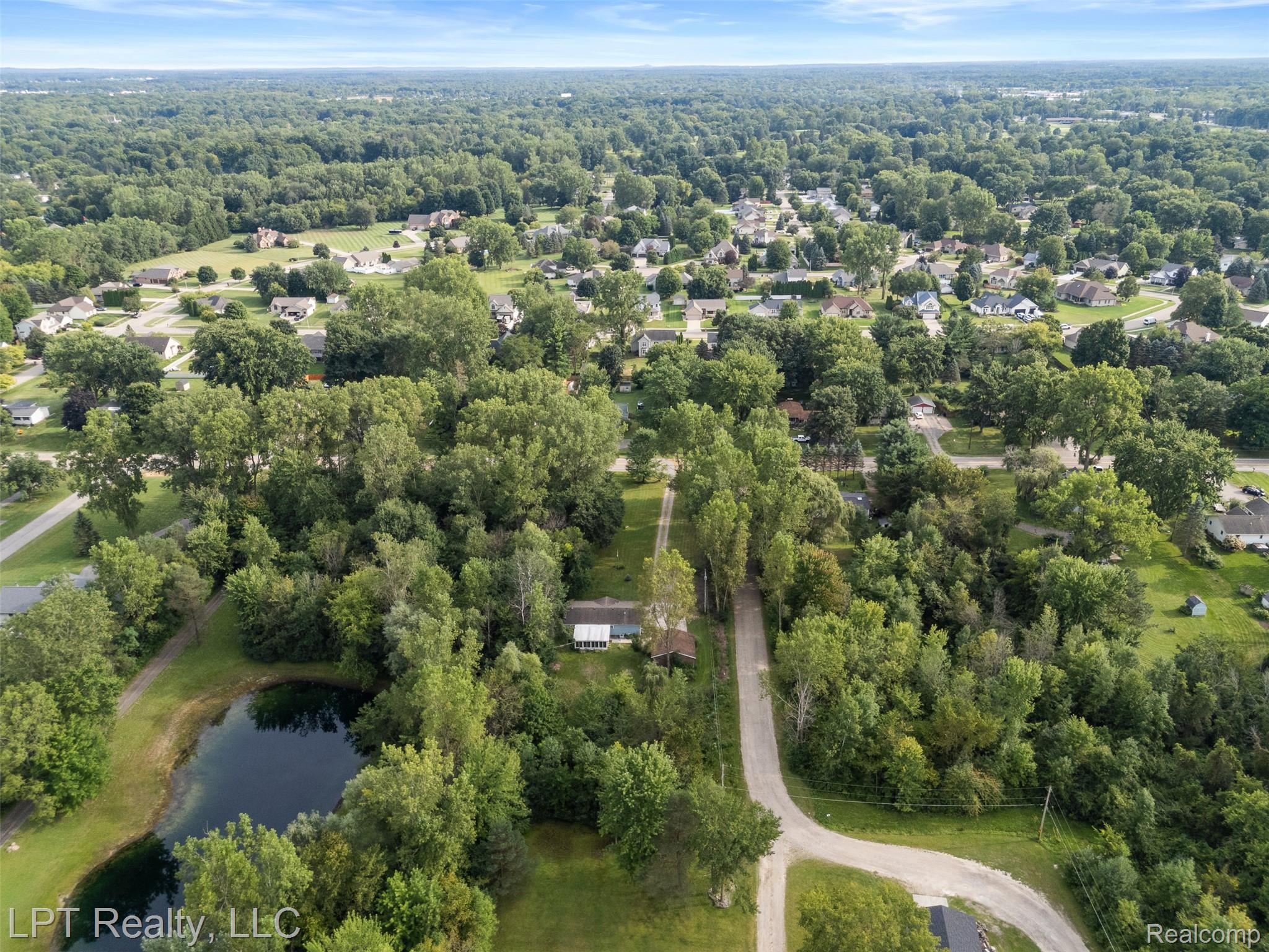 6271 East Potter Road Davison, MI 48423 - Photo 36 of 41 Aerial overview of property's location featuring a large body of water