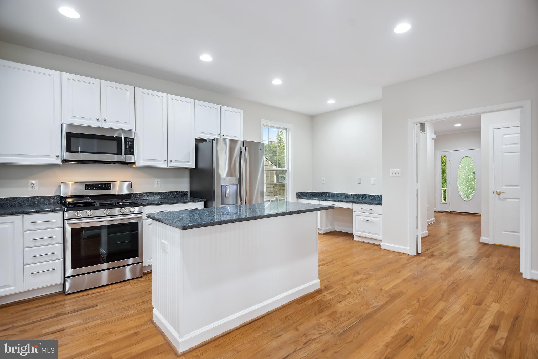 3303 Decatur Avenue Kensington, MD 20895 - Photo 35 of 94 Center Island Showing Stainless Steel Appliances