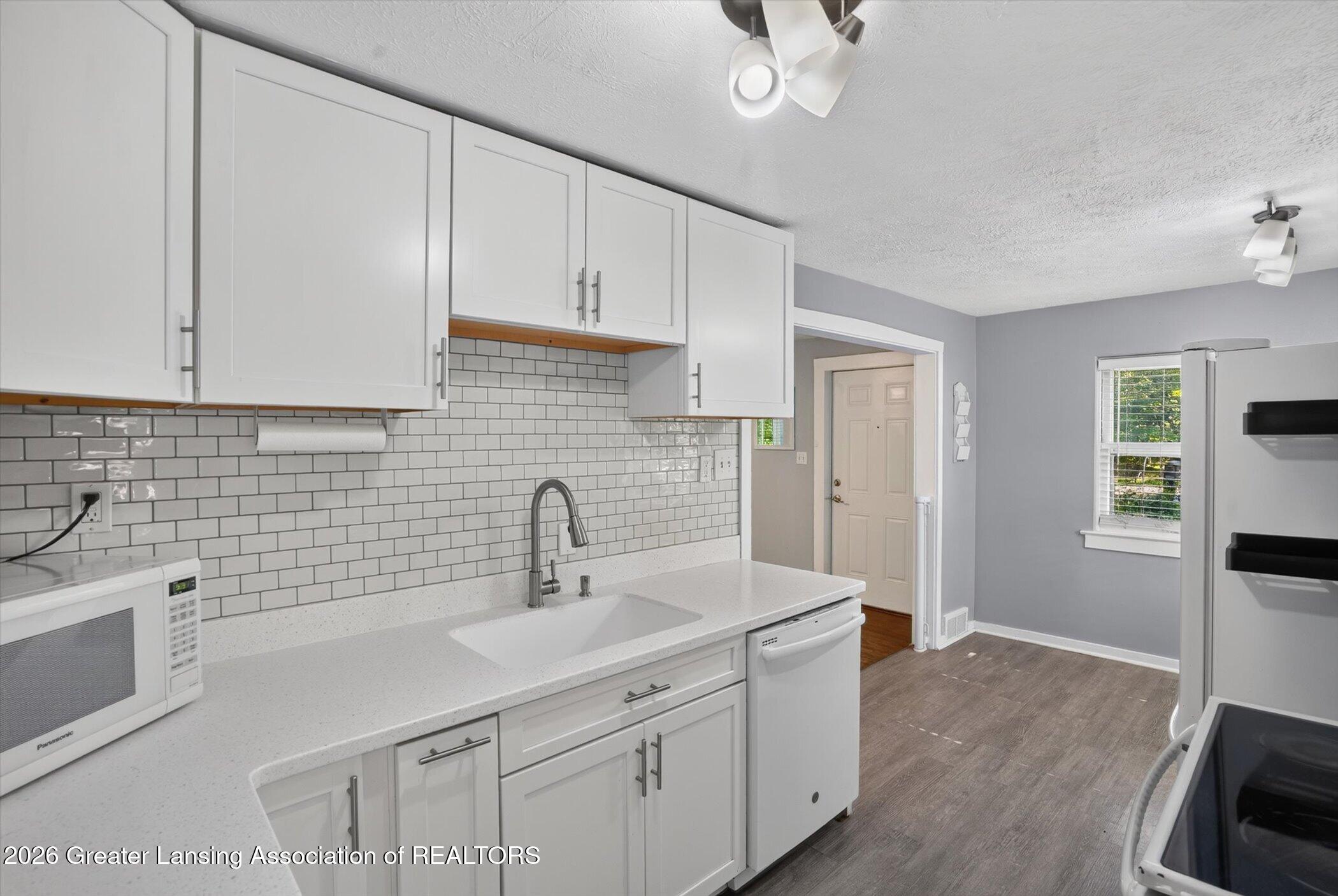 2020 Hamilton Road Okemos, MI 48864 - Photo 8 of 38 09-2020-Hamilton-Rd-WindowStill-Photogra