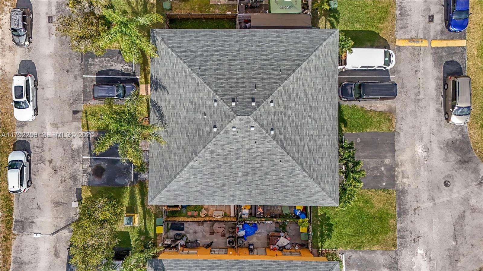 265 Northeast 12th Avenue, Unit 265 Homestead, FL 33030 - Photo 18 of 21 an aerial view of a house with swimming pool and large trees