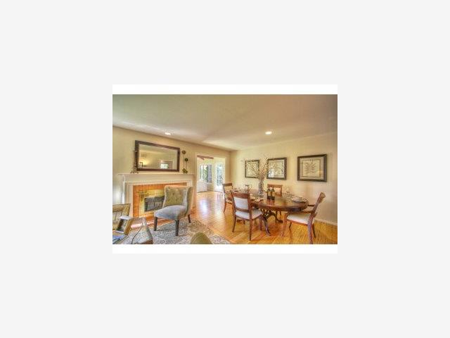 976 Springer Road Los Altos, CA 94024 - Photo 3 of 9 a living room with furniture and a table