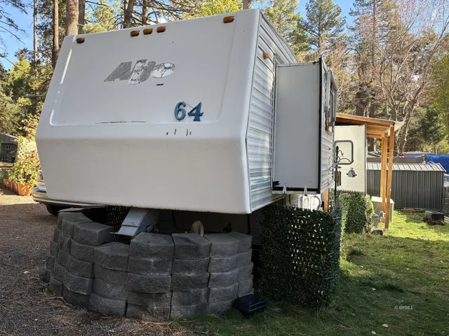 a view of barbeque area with seating area