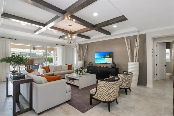 a dining room with furniture window and outside view