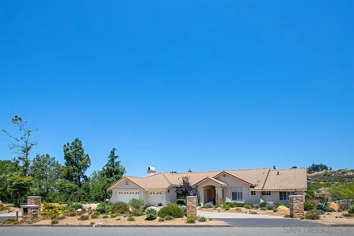 1401 Horsemill Road El Cajon, CA 92021 - Photo 3 of 36 a front view of a building with a garden