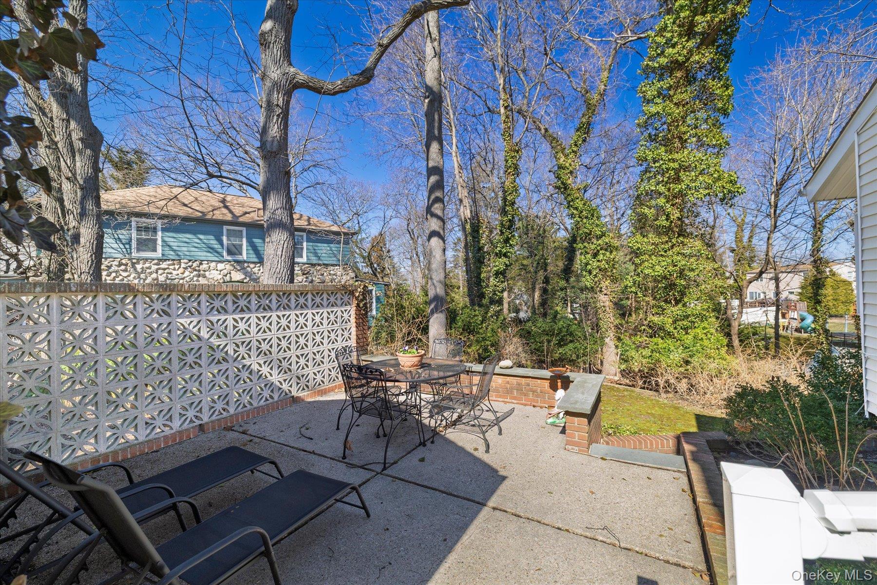 47 Elwood Road Northport, NY 11768 - Photo 24 of 28 View of patio / terrace featuring outdoor dining area