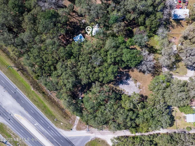 a view of outdoor space with deck and yard