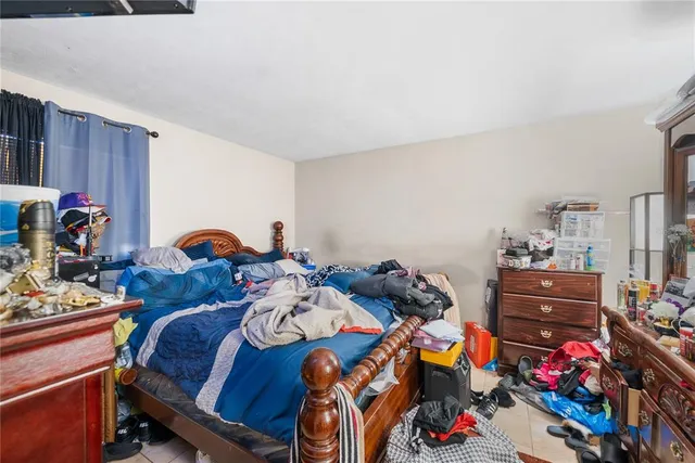 a bed room with a bed and a bed