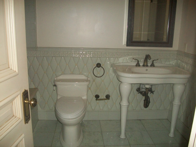 512 Primrose Road, Unit 102 Burlingame, CA 94010 - Photo 11 of 20 a bathroom with a toilet sink and mirror