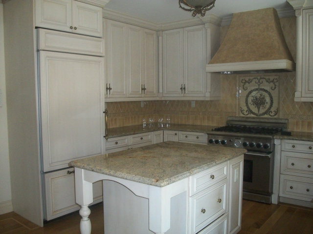 512 Primrose Road, Unit 102 Burlingame, CA 94010 - Photo 13 of 20 a kitchen with granite countertop a sink stove and cabinets