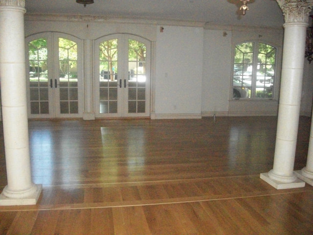 512 Primrose Road, Unit 102 Burlingame, CA 94010 - Photo 3 of 20 a view of a room with wooden floor and windows