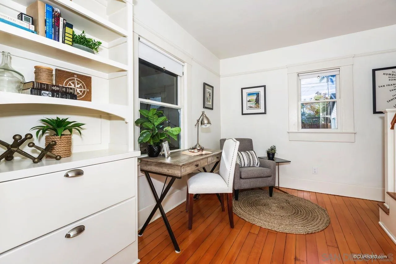 4112 Jackdaw Street San Diego, CA 92103 - Photo 12 of 34 a living room with furniture and a table
